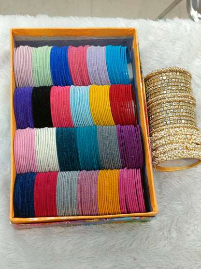 One of the Best seller combo 


24 DOZEN bangles 

4 pc lahariya 

12 pc choki bangles 

4 pc bindi chudi 

Will come with thermocol proper packing